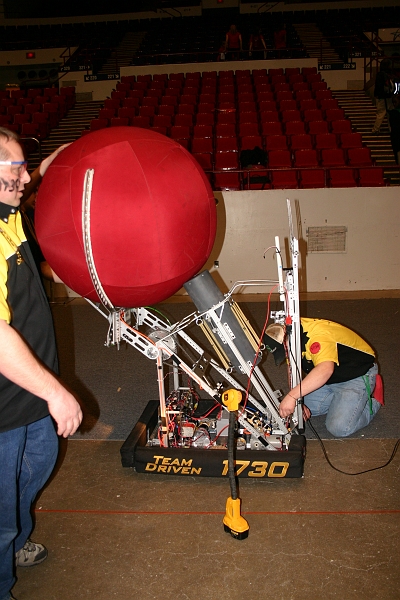 IMG_2793.JPG - Team Driven 1730 tests out their robot. They have a really cool piston launcher system.