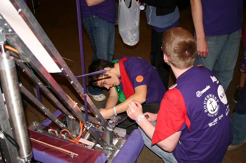 IMG_2846.JPG - Alex and Hayden working on the lift arms.